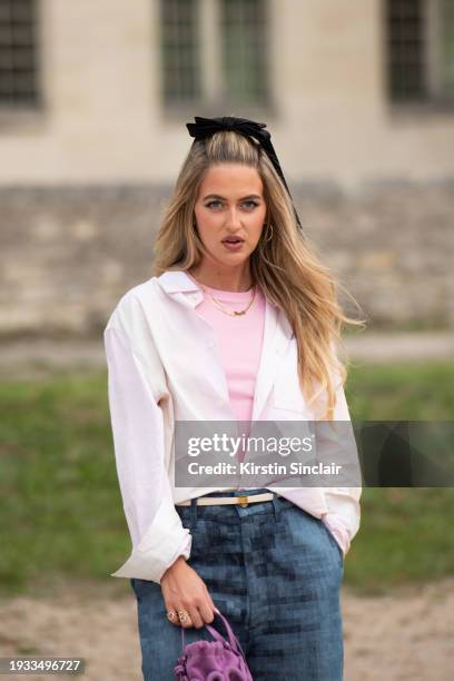 Emilie Sindlev wears all Loewe outside the Loewe show during the Womenswear Spring/Summer 2024 as part of Paris Fashion Week on September 29, 2023 in...