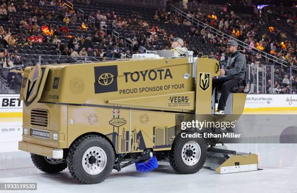Ice crew member Chris Cotsilis operates a Zamboni ice resurfacer in the rink before a game between the Calgary Flames and the Vegas Golden Knights at...