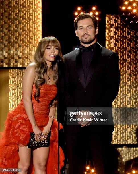 Vanessa Morgan and Giacomo Gianniotti speak onstage during the 29th Annual Critics Choice Awards at Barker Hangar on January 14, 2024 in Santa...