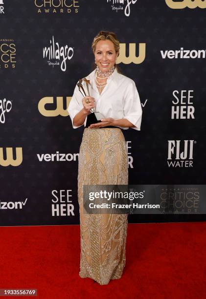 Maria Bello, winner of the Best Supporting Actress in a Limited Series or Movie Made for Television award for "Beef," poses in the press room during...