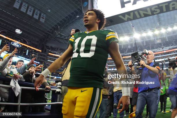 Jordan Love of the Green Bay Packers leaves the field following the NFC Wild Card Playoff game against the Dallas Cowboys at AT&T Stadium on January...