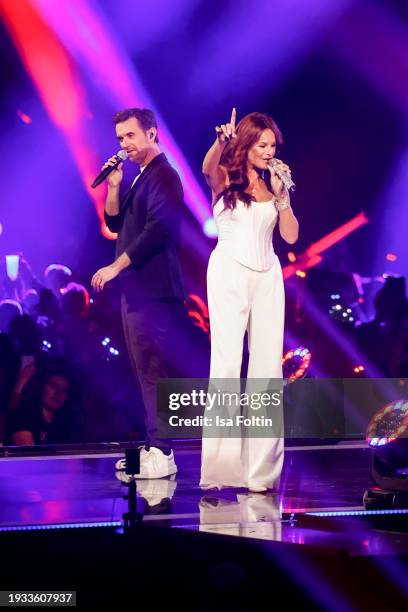 German singer and presenter Florian Silbereisen and German singer Andrea Berg perform during the Schlagerchampions Das grosse Fest der Besten at...