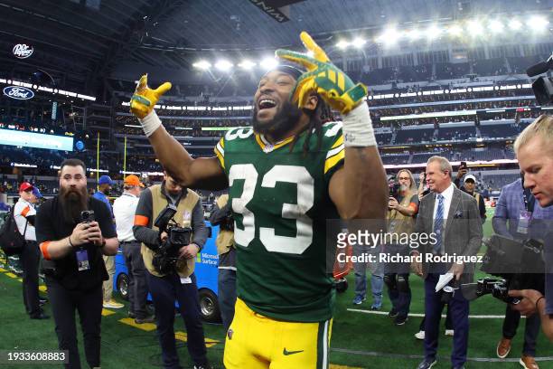 Aaron Jones of the Green Bay Packers leaves the field following the NFC Wild Card Playoff game against the Dallas Cowboys at AT&T Stadium on January...