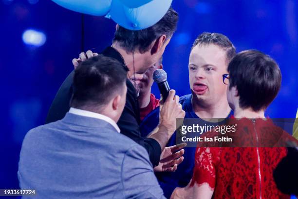 Florian Silbereisen together with kids with Down Syndrome during the Schlagerchampions Das grosse Fest der Besten at Velodrom on January 13, 2024 in...