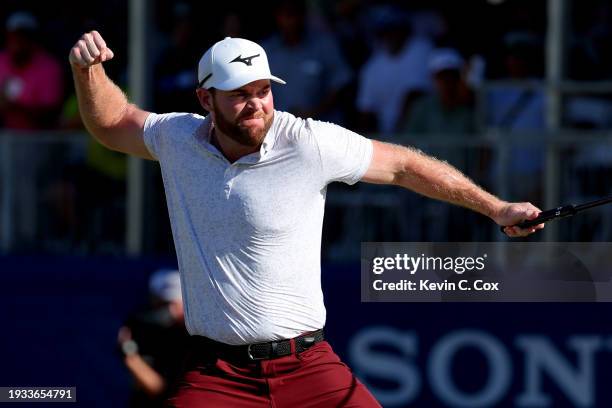 Grayson Murray of the United States celebrates after making a putt on the 18th green during the playoff round against Keegan Bradley of the United...