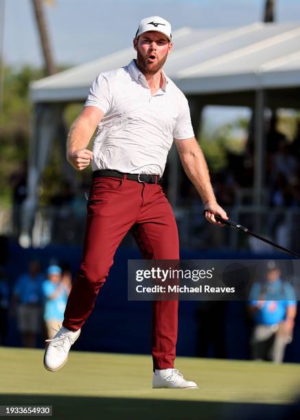 Grayson Murray of the United States celebrates after making a putt on the 18th green during the playoff round against Keegan Bradley of the United...