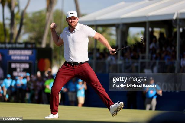 Grayson Murray of the United States celebrates after making a putt on the 18th green during the playoff round against Keegan Bradley of the United...