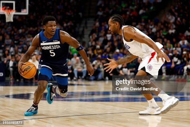 Anthony Edwards of the Minnesota Timberwolves drives to the basket against Kawhi Leonard of the LA Clippers in the third quarter at Target Center on...