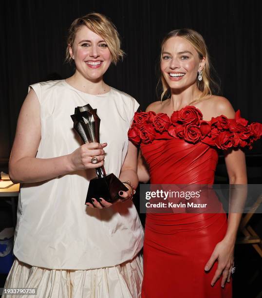 Greta Gerwig and Margot Robbie, winners of the Best Comedy Award for 'Barbie,' pose backstage during the 29th Annual Critics Choice Awards at Barker...