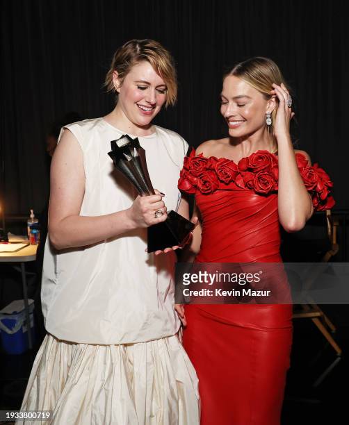 Greta Gerwig and Margot Robbie, winners of the Best Comedy Award for 'Barbie,' pose backstage during the 29th Annual Critics Choice Awards at Barker...