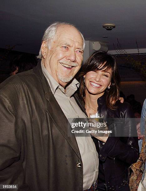 Director Robert Altman and actress Gina Gershon attend the after party for the New York premiere of "A Decade Under The Influence" April 15, 2003 at...