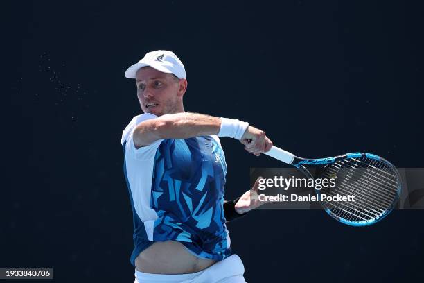 James Duckworth of Australia plays a forehand in their round one singles match against Luca Van Assche of France during the 2024 Australian Open at...