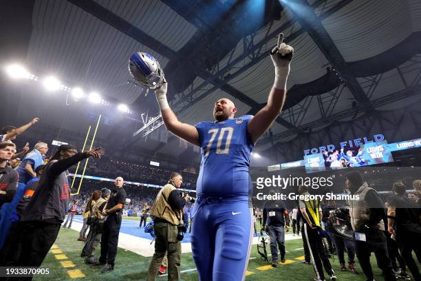 Dan Skipper of the Detroit Lions celebrates after defeating the Los Angeles Rams 24-23 in the NFC Wild Card Playoffs at Ford Field on January 14,...