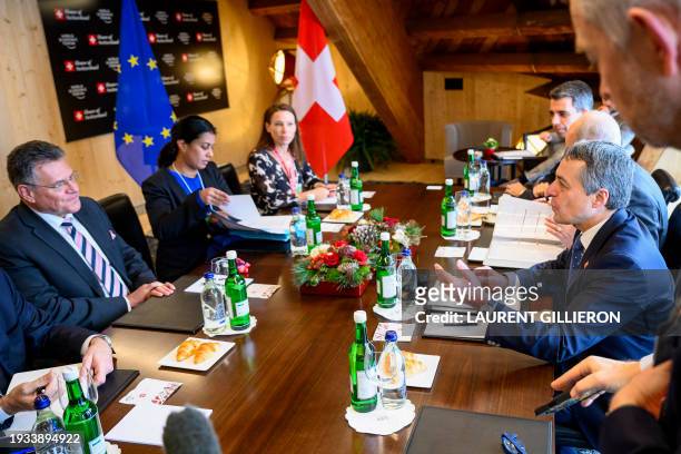 Swiss Foreign Minister Ignazio Cassis speaks with European Commission Executive Vice-President Maros Sefcovic prior to a bilateral meeting in the...
