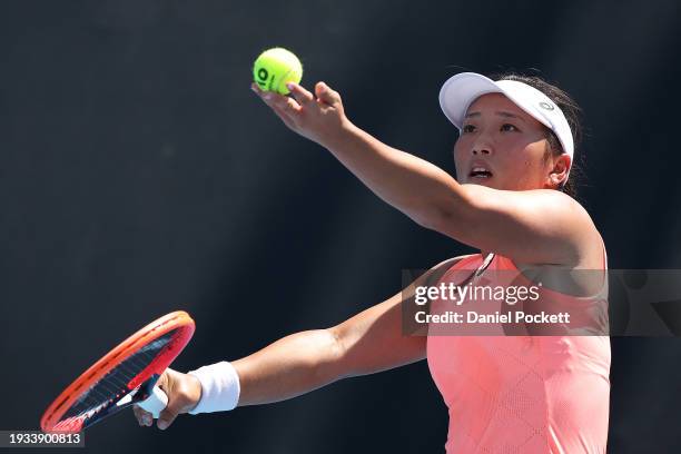 Claire Liu of the United States serves in their round one singles match against Marta Kostyuk of Ukraine during the 2024 Australian Open at Melbourne...