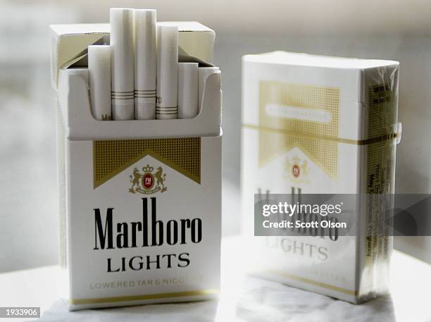 Cigarette maker Phillip Morris USA announced it has started removing the controversial words "lowered tar and nicotine" from packages of Marlboro...