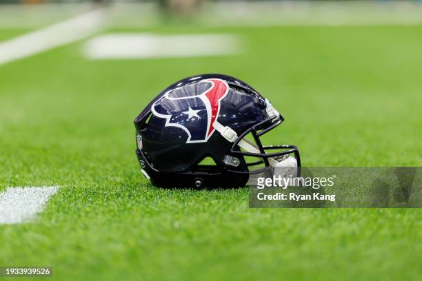 Detail view of a Houston Texans helmet on the field before an AFC wild-card playoff football game against the Cleveland Browns at NRG Stadium on...
