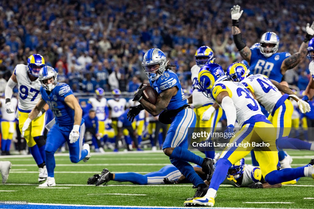 Jahmyr Gibbs of the Detroit Lions scores a touchdown during the game ...