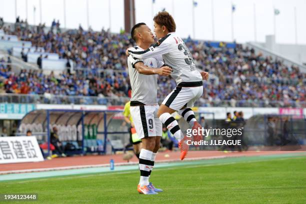 Shota Kaneko of Shimizu S-Pulse celebrates with teammate Jong Tae-se after scoring the team's second goal during the J.League J2 match between...