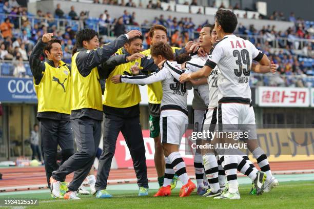 Shota Kaneko of Shimizu S-Pulse celebrates with teammates after scoring the team's second goal during the J.League J2 match between Tokushima Vortis...