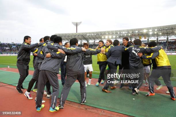 Shimizu S-Pulse players celebrate the team's promotion to the J1 following the 2-1 victory in the J.League J2 match between Tokushima Vortis and...