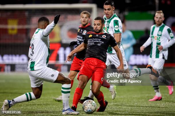 Leandro Bacuna of FC Groningen and Redouan el Yaakoubi of Excelsior Rotterdam battle for possession during the TOTO KNVB Cup match between Excelsior...