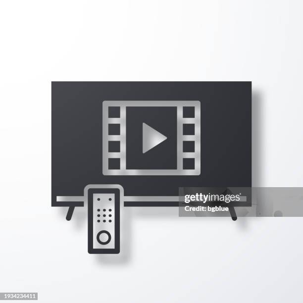 watch video on tv. icon with shadow on white background - streaming video remote stock illustrations