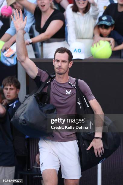 Andy Murray of Great Britain acknowledges the fans after losing his round one singles match against Tomas Martin Etcheverry of Argentina during the...