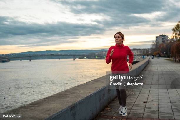 fitness woman running training for marathon - sport determination stock pictures, royalty-free photos & images