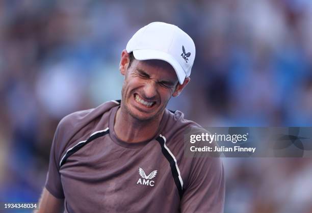 Andy Murray of Great Britain reacts in their round one singles match against Tomas Martin Etcheverry of Argentina during the 2024 Australian Open at...