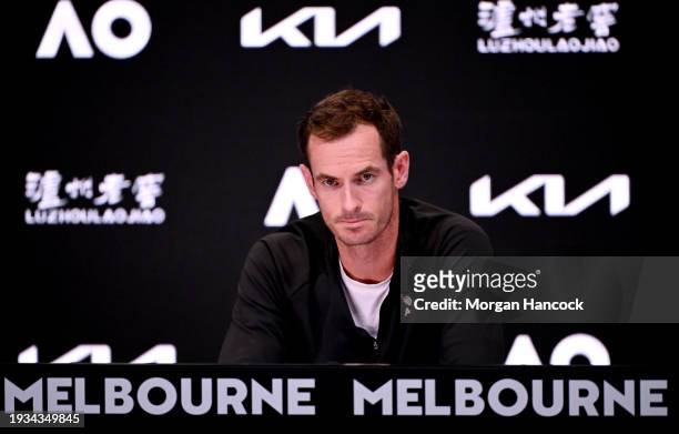 Andy Murray of Great Britain speaks to the media after his first round match loss against Tomas Martin Etcheverry of Argentina during the 2024...