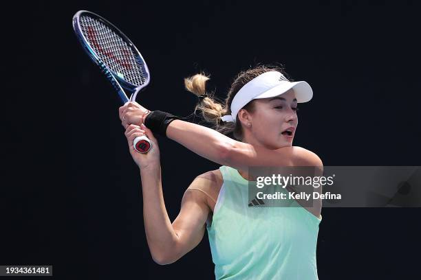 Anna Kalinskaya plays a backhand in their round one singles match against Katie Volynets of the United States during the 2024 Australian Open at...