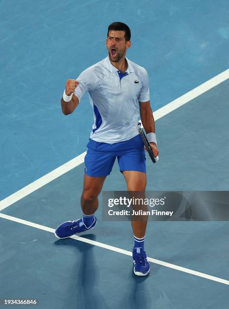 Novak Djokovic of Serbia celebrates winning set point in their round one singles match against Dino Prizmic of Croatia during day one of the 2024...