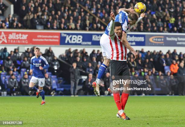 Jobe Bellingham of Sunderland is beaten to a header by George Edmundson of Ipswich during the Sky Bet Championship match between Ipswich Town and...