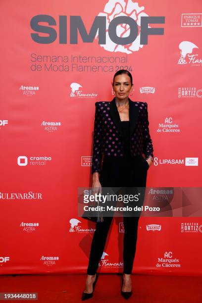 Spanish model Nieves Alvarez poses as she attend the inauguration of SIMOF 2024, International Flamenco Fashion Show, at FIBES Conference and...