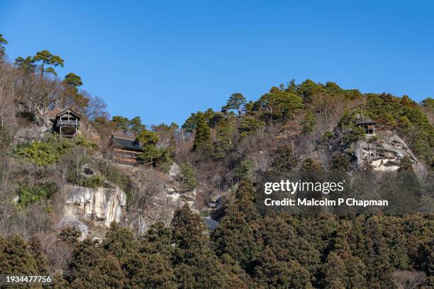 yamadera (yama-dera) near yamagata, japan. a popular tourist destination known as 1,015 stone steps of yamadera. - yamadera stock pictures, royalty-free photos & images