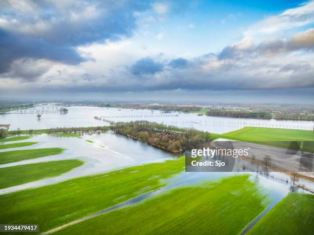 vecht river high water level flooding at dalfsen - overflowing river stock pictures, royalty-free photos & images