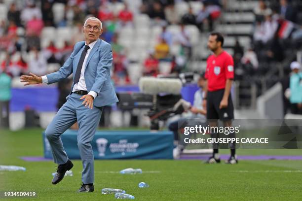 Syria's Argentine coach Hector Cuper reacts during the Qatar 2023 AFC Asian Cup Group B football match between Syria and Australia at the Jassim bin...