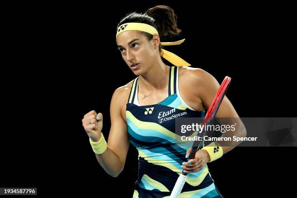 Caroline Garcia of France celebrates a point in their round one singles match against Naomi Osaka of Japan during the 2024 Australian Open at...