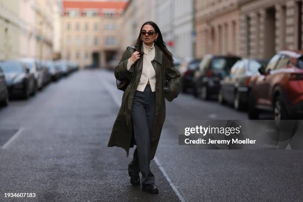 Anna Winter seen wearing Gucci brown tortoise sunglasses, silver earrings / hoops, Samsoe Samsoe cream white wool knit cardigan zip jacket, Cartier...