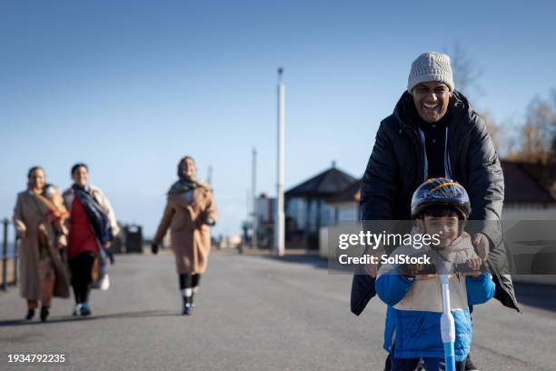 a family's scenic stroll - pakistani culture stock pictures, royalty-free photos & images