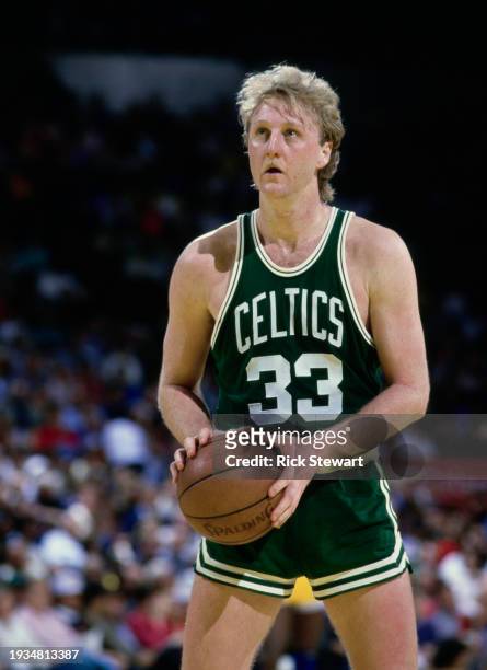 Larry Bird, Power Forward for the Boston Celtics prepares to shoot a free throw to the basket during the NBA Pacific Division basketball game against...