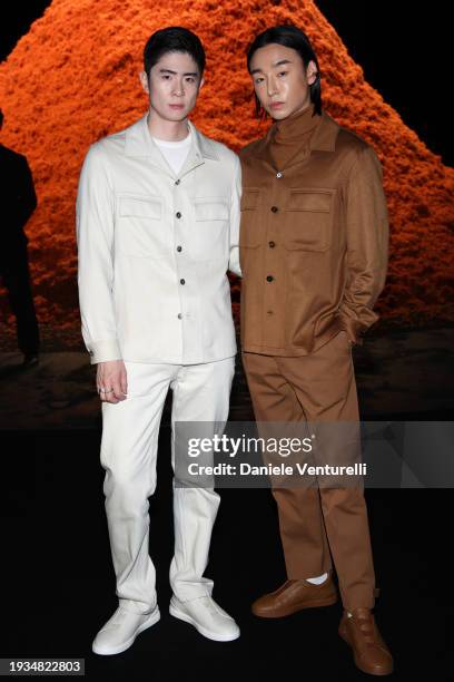 Taiki Takahashi and Noah Lee attend the Zegna fashion show during the Milan Menswear Fall/Winter 2024-2025 on January 15, 2024 in Milan, Italy.