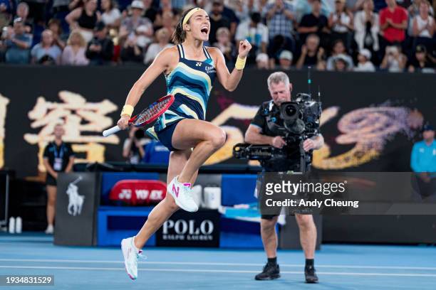 Caroline Garcia of France celebrates match point in their round one singles match against Naomi Osaka of Japan during the 2024 Australian Open at...