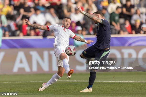 Ezequiel Ham of Syria attempts to intercept during the AFC Asian Cup Group B match between Syria and Australia at Jassim Bin Hamad Stadium on January...