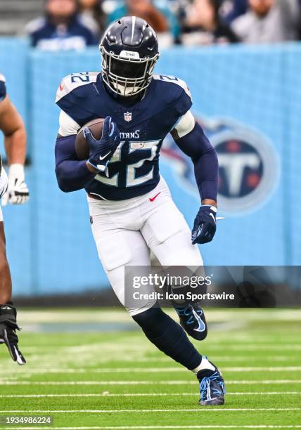 Tennessee Titans running back Derrick Henry runs the ball during the NFL game between the Tennessee Titans and the Jacksonville Jaguars on January 7...