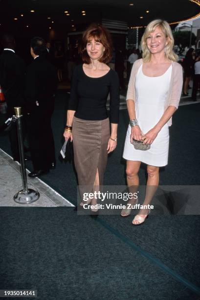 American actors Dana Delany and Chloe Webb attend the premiere of 'Saving Private Ryan' at the Mann Village Theatre, Los Angeles, 21st July 1998.