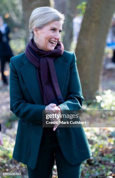 Sophie, Duchess of Edinburgh walks into the woodland area to plant some seeds, plant a tree with the tree Wardens and meet children from the Forest...