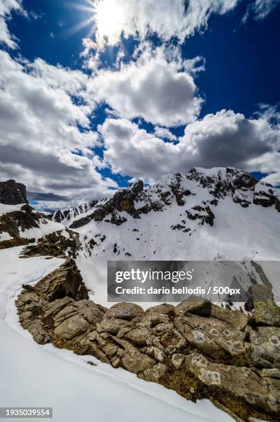 scenic view of snow covered mountains against sky,san vito di cadore,belluno,italy - panorama di nuvole fotografías e imágenes de stock