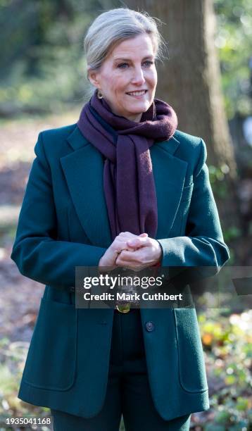 Sophie, Duchess of Edinburgh walks into the woodland area to plant some seeds, plant a tree with the tree Wardens and meet children from the Forest...